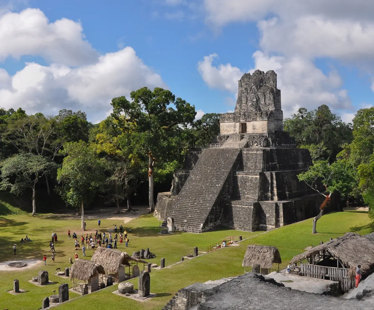 Visitors on the Great Plaza between the temples